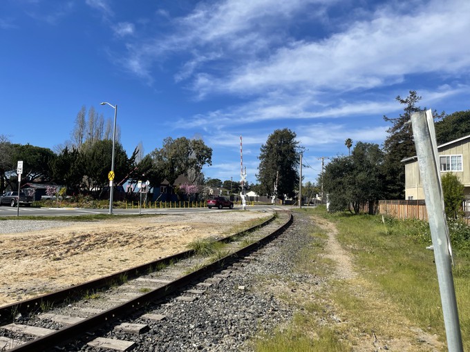 Looking northwest at the tracks crossing Bay Street in Santa Cruz.