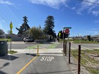 The intersection of the rail trail with Dufour Street, looking east.