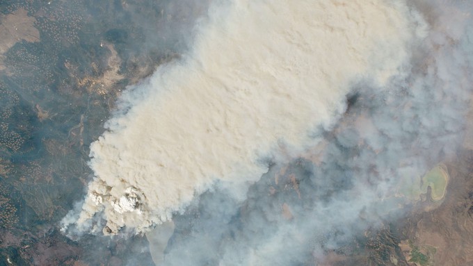 Image caption: The Dixie Fire, as seen from a NASA Satellite on August 4.