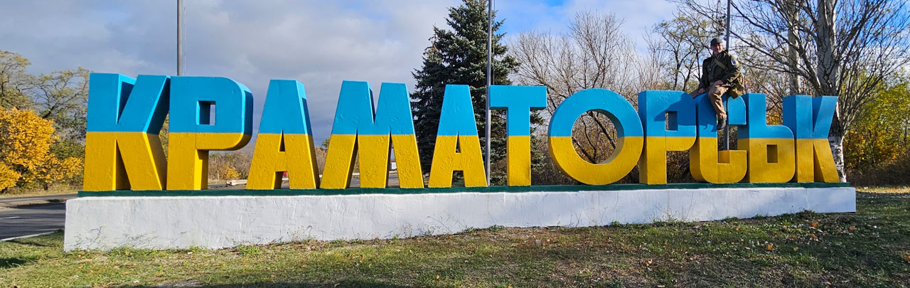 Word sculpture with letters painted the colors of the Ukrainian flag