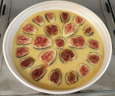 Cake batter and figs before baking