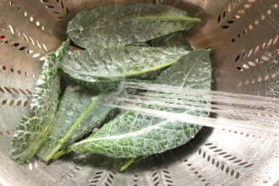 Kale leaves in colander