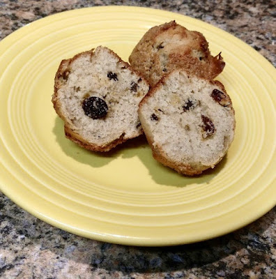 Split muffins on yellow plate