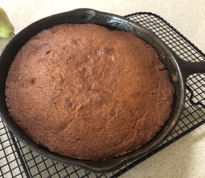 Very brown  cake in a skillet