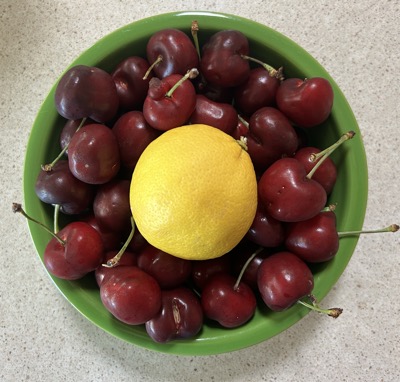 Cherries and a lemon