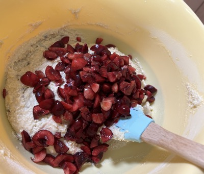 Chopped cherries and muffin batter