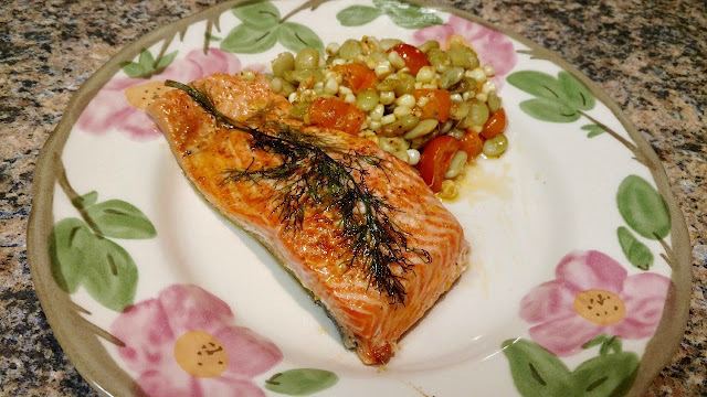 Steelhead fillet and succotash on a plate