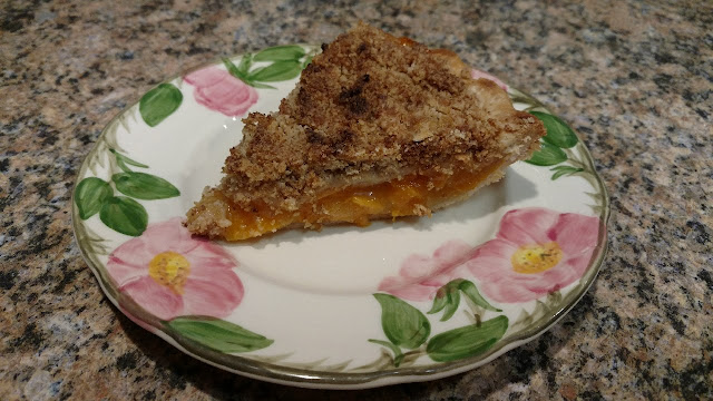 Slice of apricot pie on a plate