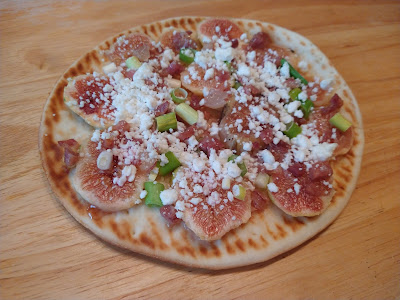 Pizza with cheese and figs