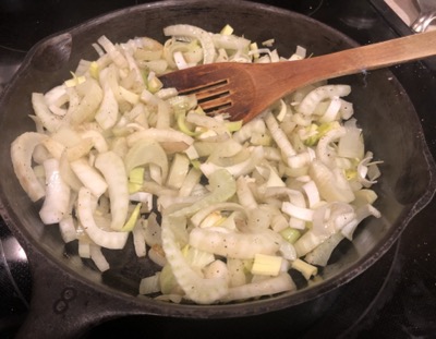Fennel slices being sauteed
