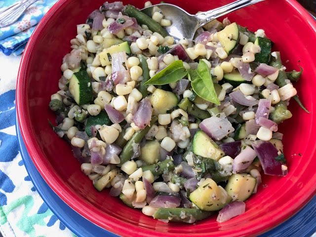 Red bowl with vegetables