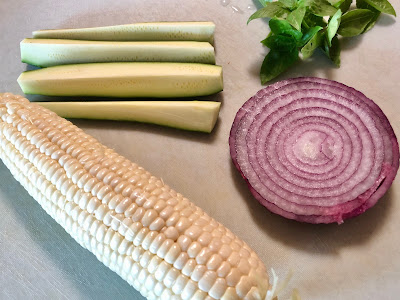 Onion slice, zucchini, basil and ear of corn