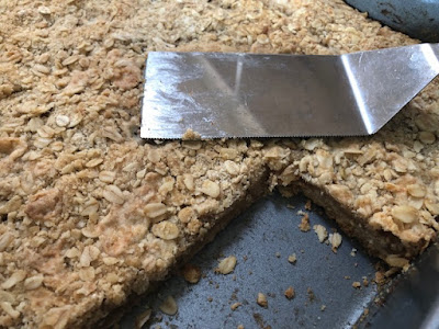 Pan of apple pie bars showing the filling