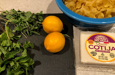 Herbs, two lemons, noodles and cheese