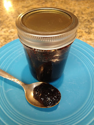 Jar of conserve with spoon