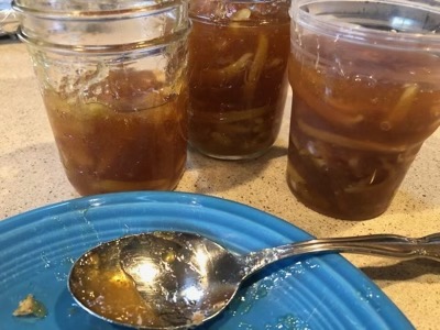 2 glass jars and 1 plastic one with marmalade
