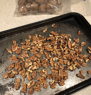 Walnuts on baking sheet