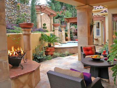 Patio exhibit with fountain and chairs