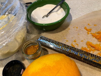 Sugar, orange zest and spices