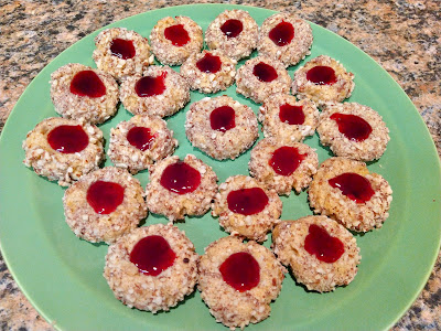 Thumbprint cookies on a green plate