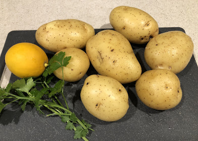 Potatoes, lemon, herbs