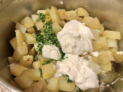 Potatoes with blob of crème fraîche