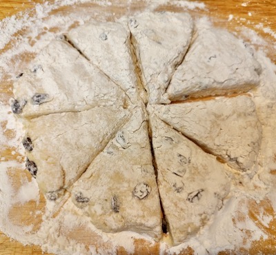 Scone dough on a flour-covered board