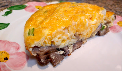 Cheese-topped frittata slice