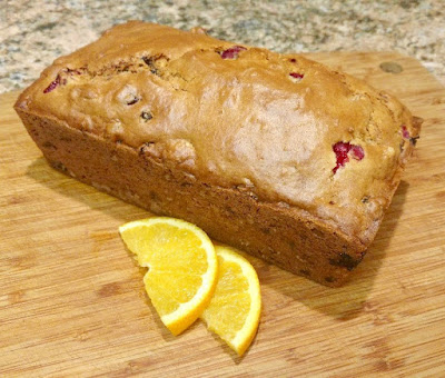 Loaf of tea bread with orange slices