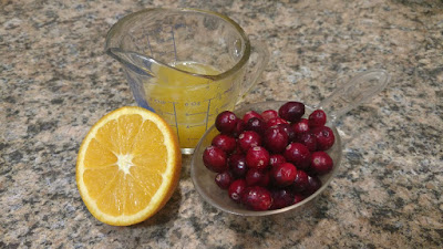 Oranges, juice and cranberries
