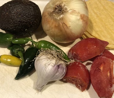 Vegetables for soup and some uncooked tortillas