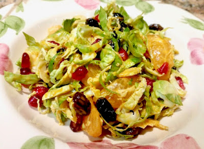 Salad with Brussel sprouts, mandarin oranges and pomegranate arils