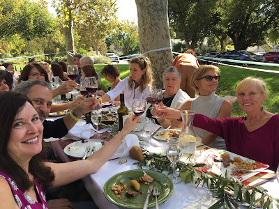 People at a table outdoors