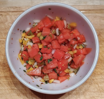 White bowl with watermelon salsa