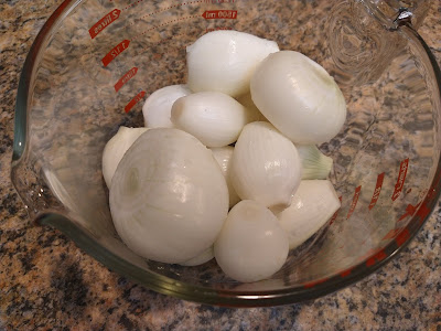 Bowl of peeled onions