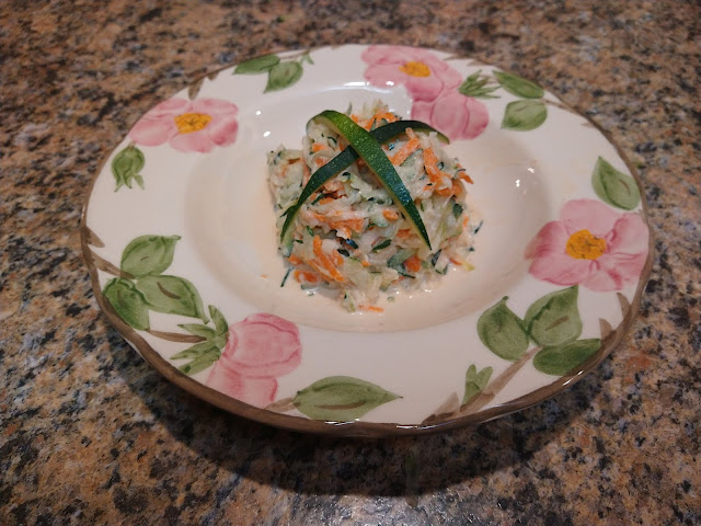 Plate with mound of zucchini slaw
