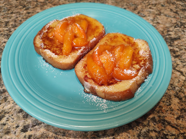 Apricot french toast on a turquoise plate
