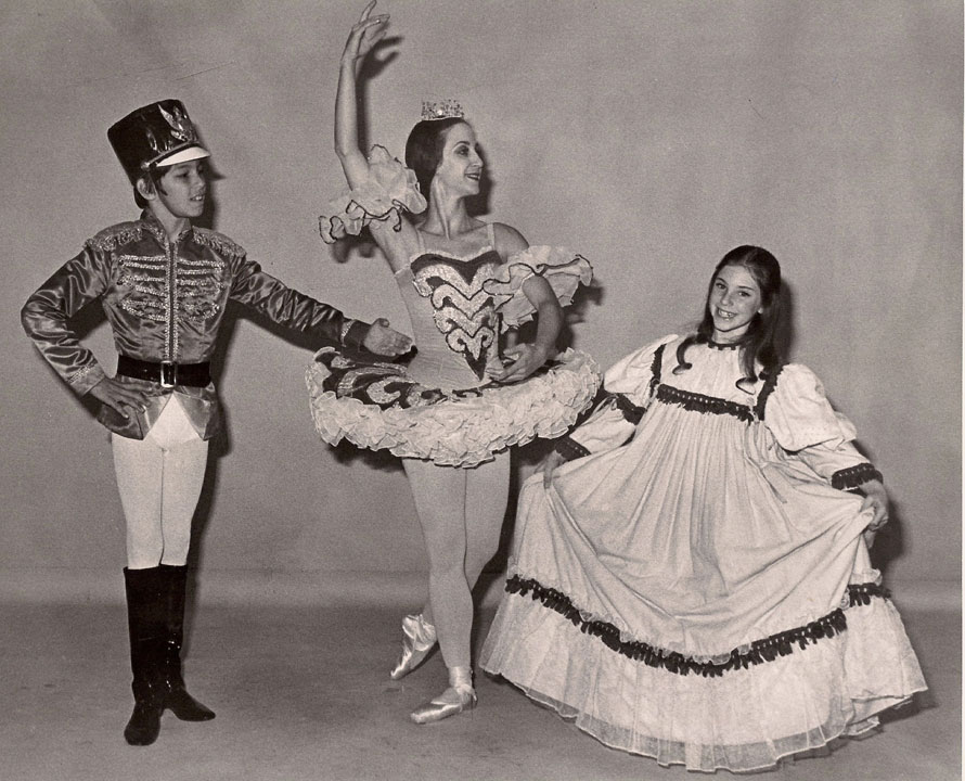 Three dancers performing The Nutcracker ballet